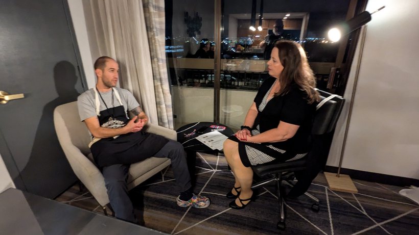 A contestant in a one-on-one with the host